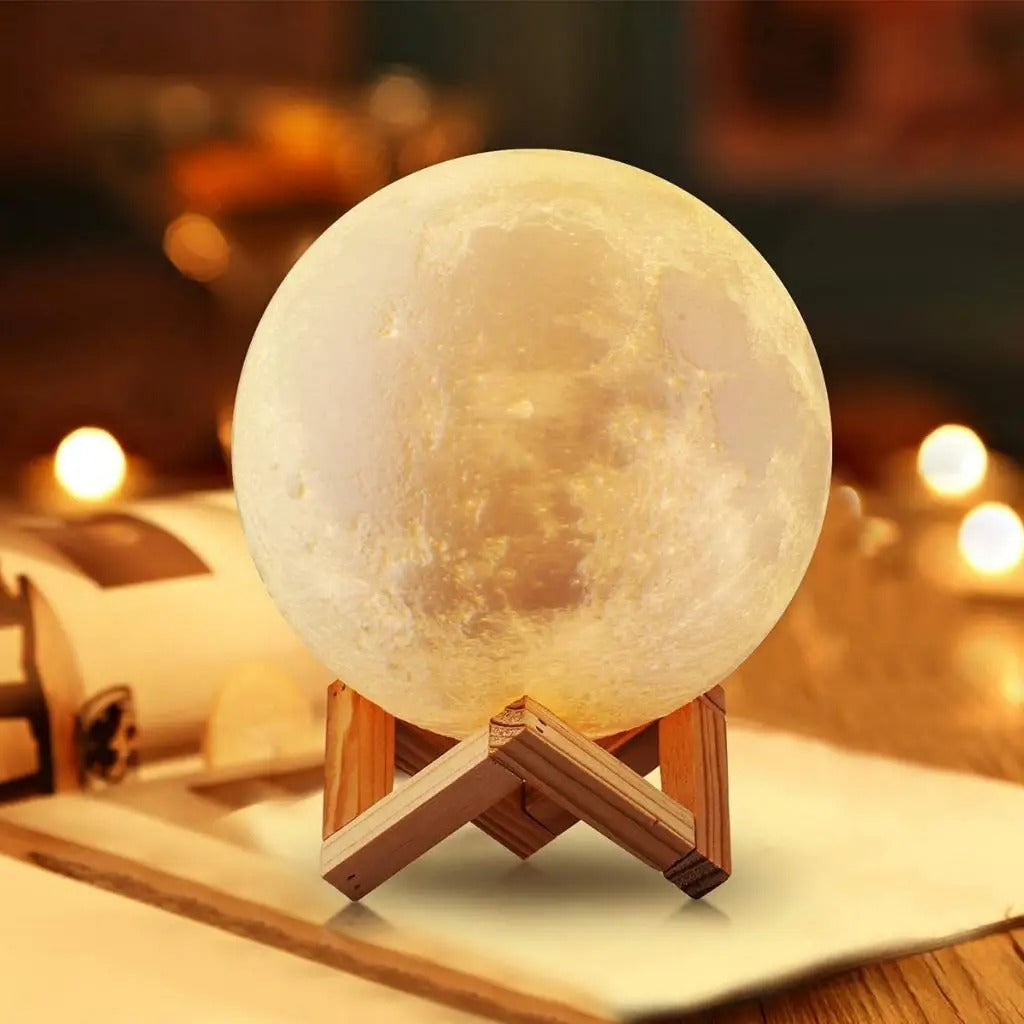 3D Moon Lamp on desk with warm glow